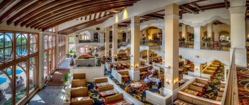 An aerial view of Café Osceola with booths, tables, and windows overlooking the pools. Come to Café Osceola for a Thanksgiving buffet. 